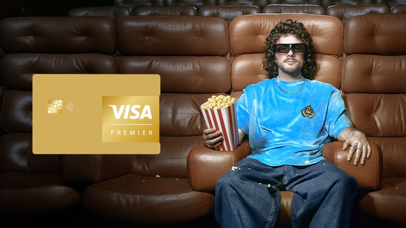 man at cinema holding popcorn