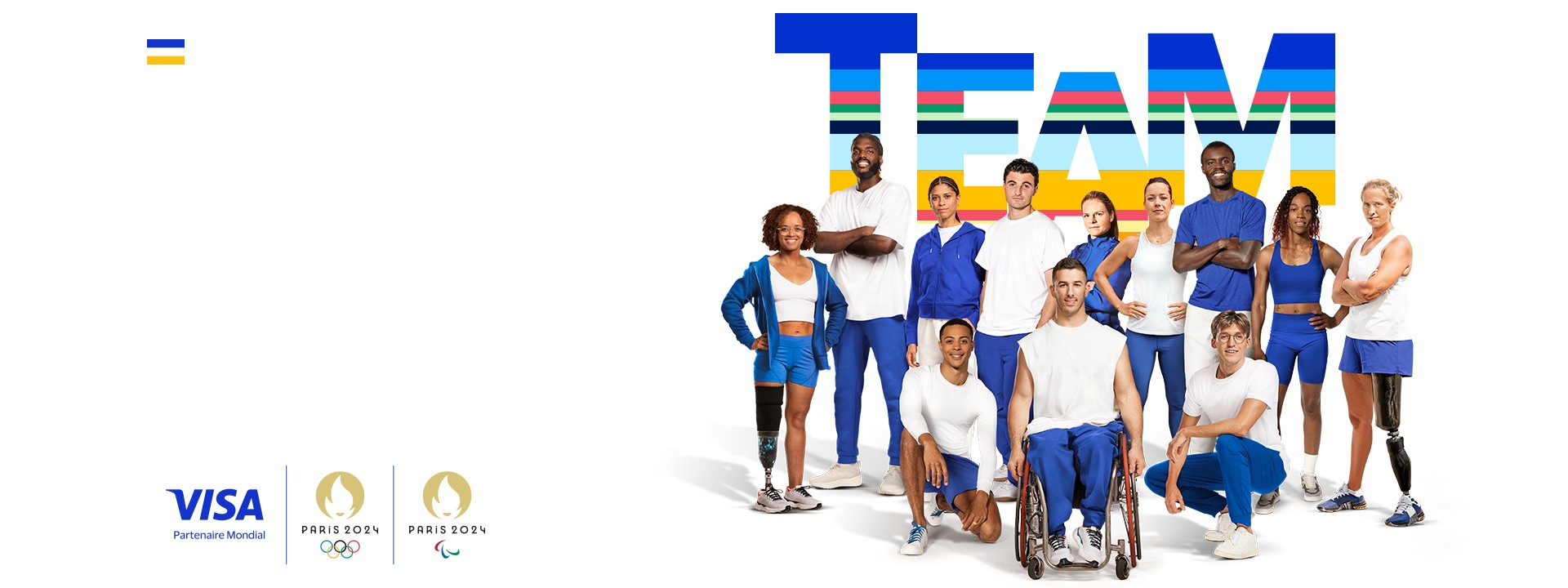 Olympic and Paralympic athletes in front of a large sign that says team.