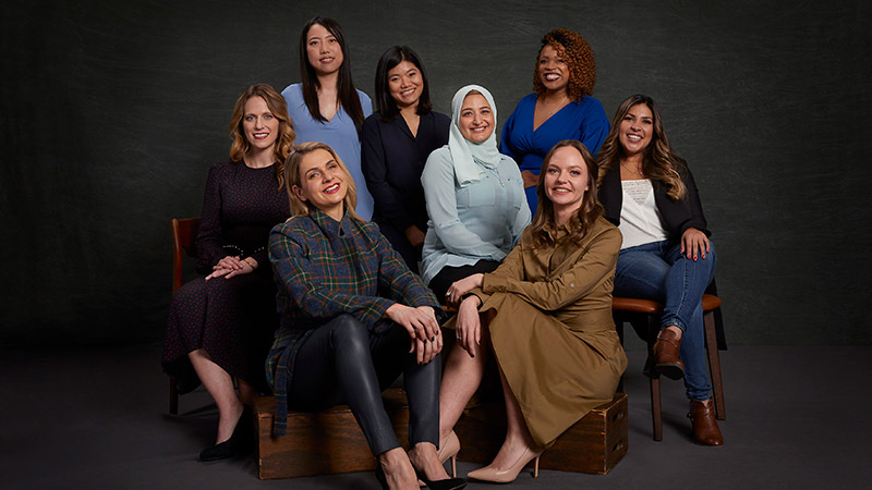 women entrepreneurs posed together and seated
