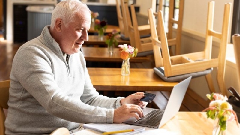 Older man at his laptop